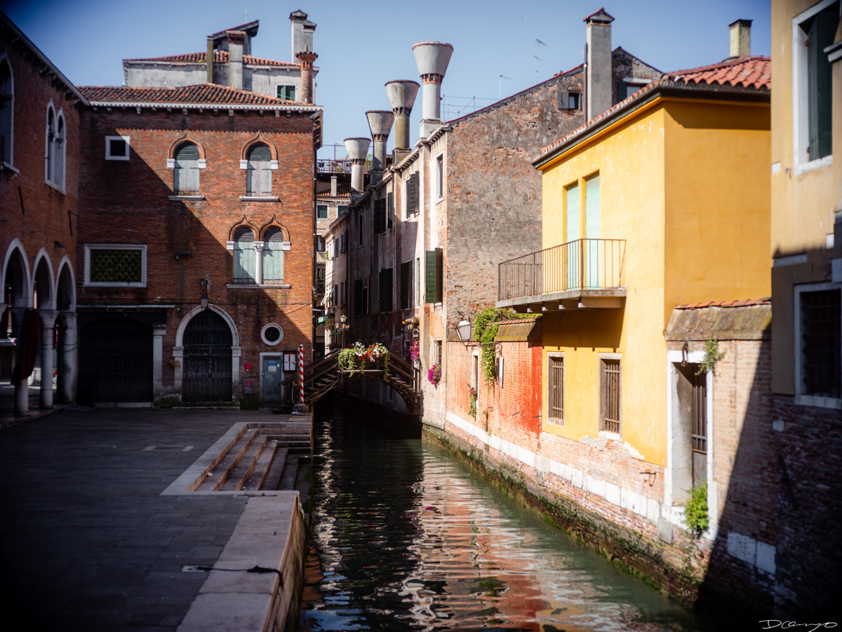 Photos from a trip through Italy in Summer of 2023. Locations include Rome, Florence, Tuscany, Castello di Bossi in Chianti, Siena, San Gimignano, Sirmione on Lake Garda, Bologna, Gudon, Italian Dolomites, Seceda, Cadini di Misurina, and Venice.